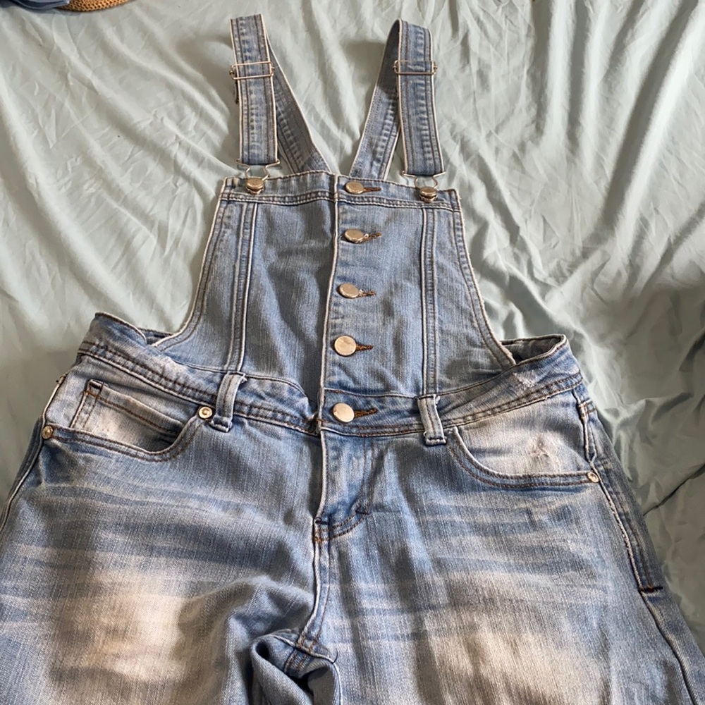 Blue jean overalls. skinny leg